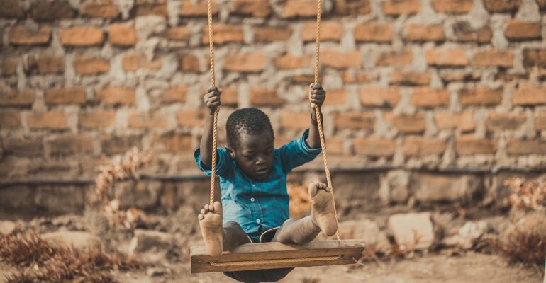 A child playing photo by Git Stephen Gitau