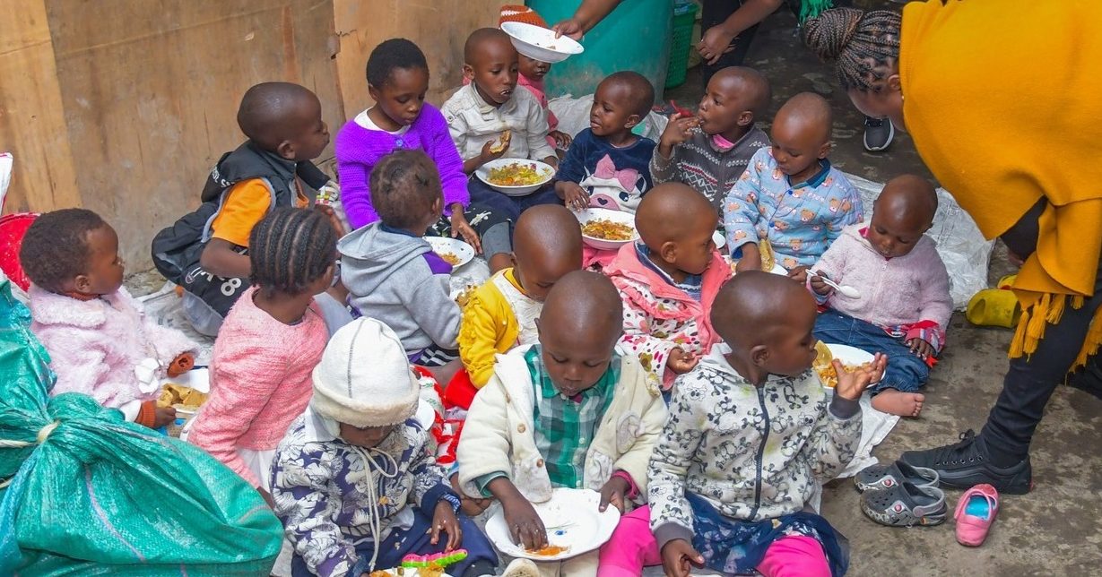 Children eating at smile community centre children's home in Nairobi,Kenya